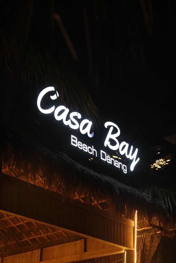 Casa Bay Beach Danang neon sign glowing at night